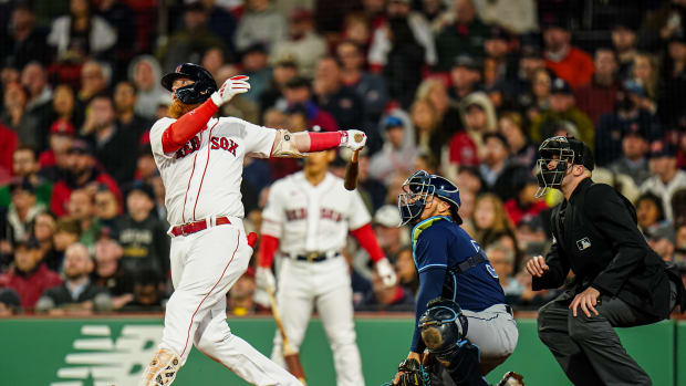 Sep 26, 2023; Boston, Massachusetts, USA; Boston Red Sox designated hitter Justin Turner (2) singles to center field to drive in a run against the Tampa Bay Rays in the seventh inning at Fenway Park. Mandatory Credit: David Butler II-USA TODAY Sports  